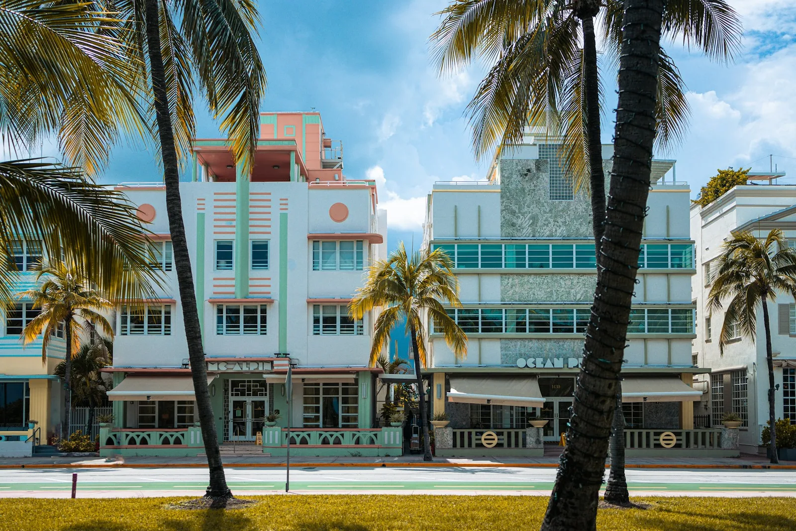 Pastel Art Deco facade and palms in Miami Beach